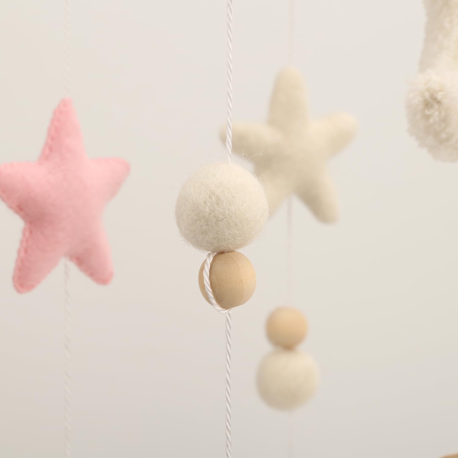 Flora & Ivy Cloud Mobile for Crib - white and pink design complements gender-neutral nurseries.