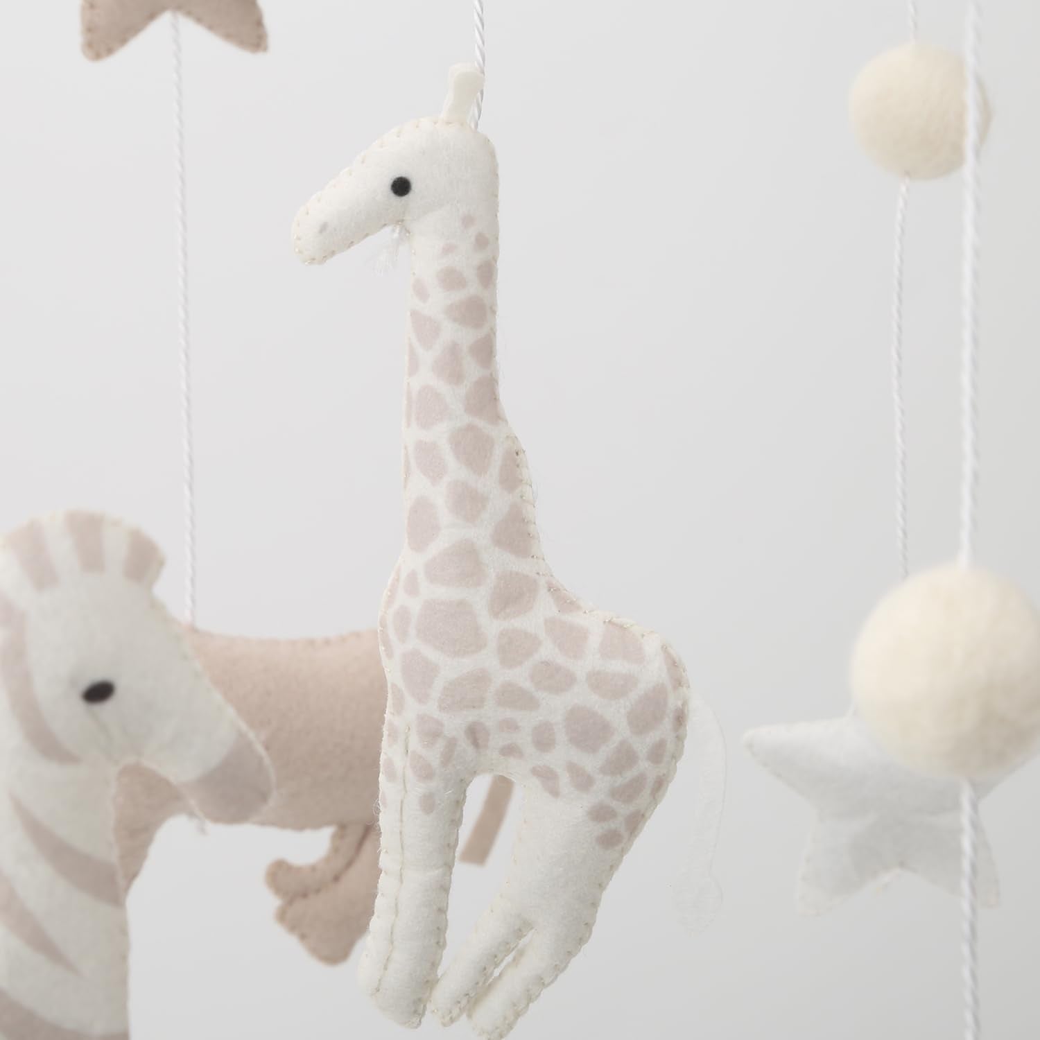 Flora & Ivy Safari Mobile Clouds white clouds and stars add dreamy touch