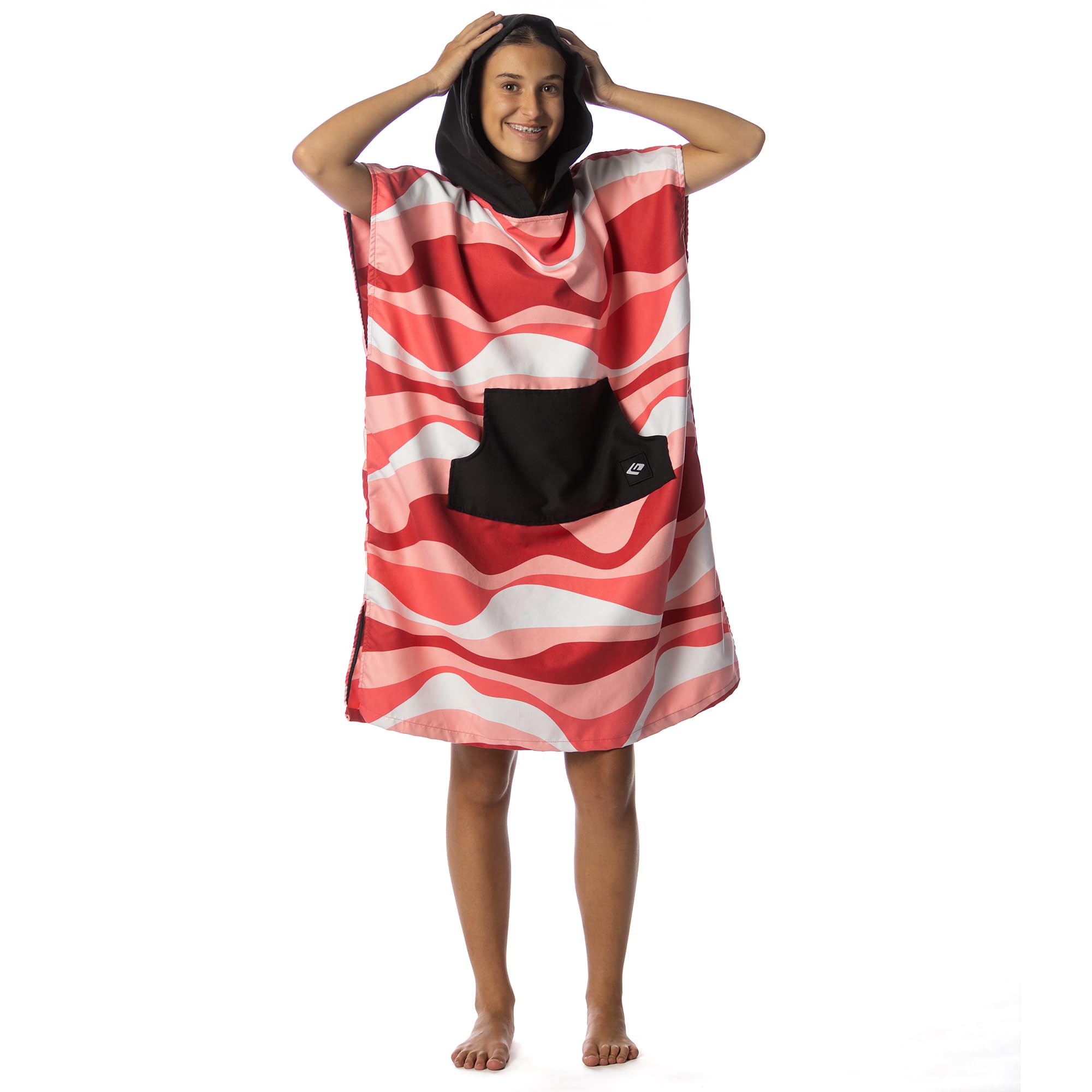 Flow Changing Poncho Kids in action pinkwave shows ready-to-wear comfort after splash