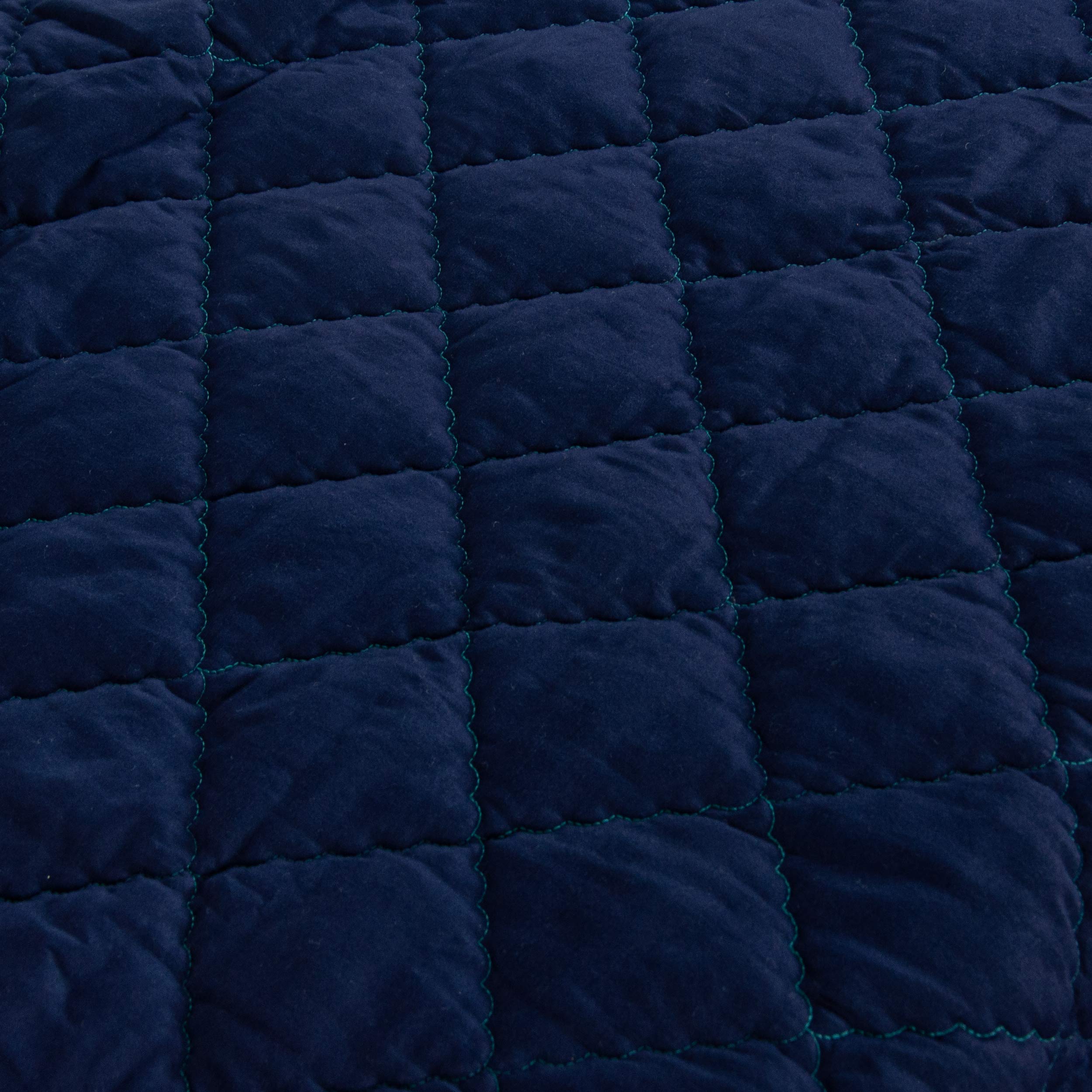 FLXXIE comforter stroller-use scene shows lightweight fabric for easy on-the-go cuddles.