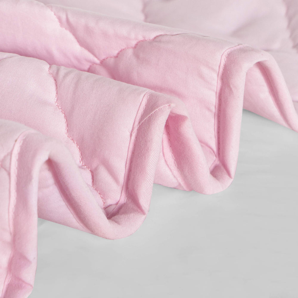 FLXXIE Microfiber closeup texture reveals soft, breathable surface suitable for all seasons.