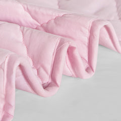 FLXXIE Microfiber closeup texture reveals soft, breathable surface suitable for all seasons.