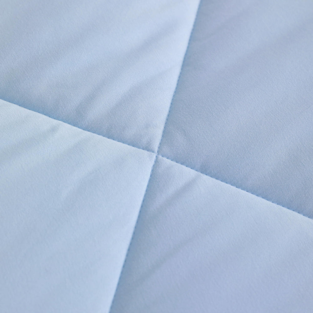 FLXXIE flat-sheet closeup highlights generous dimensions for easy bed prep