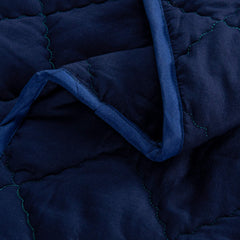FLXXIE toddler comforter navy snuggle closeup emphasizes gentle warmth and kid-friendly feel.