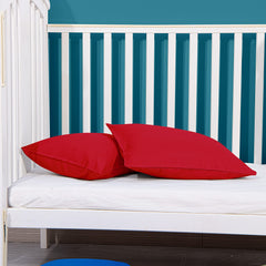 FLXXIE toddler pillowcase red on bed reveals generous two-pack value and gentle finish.