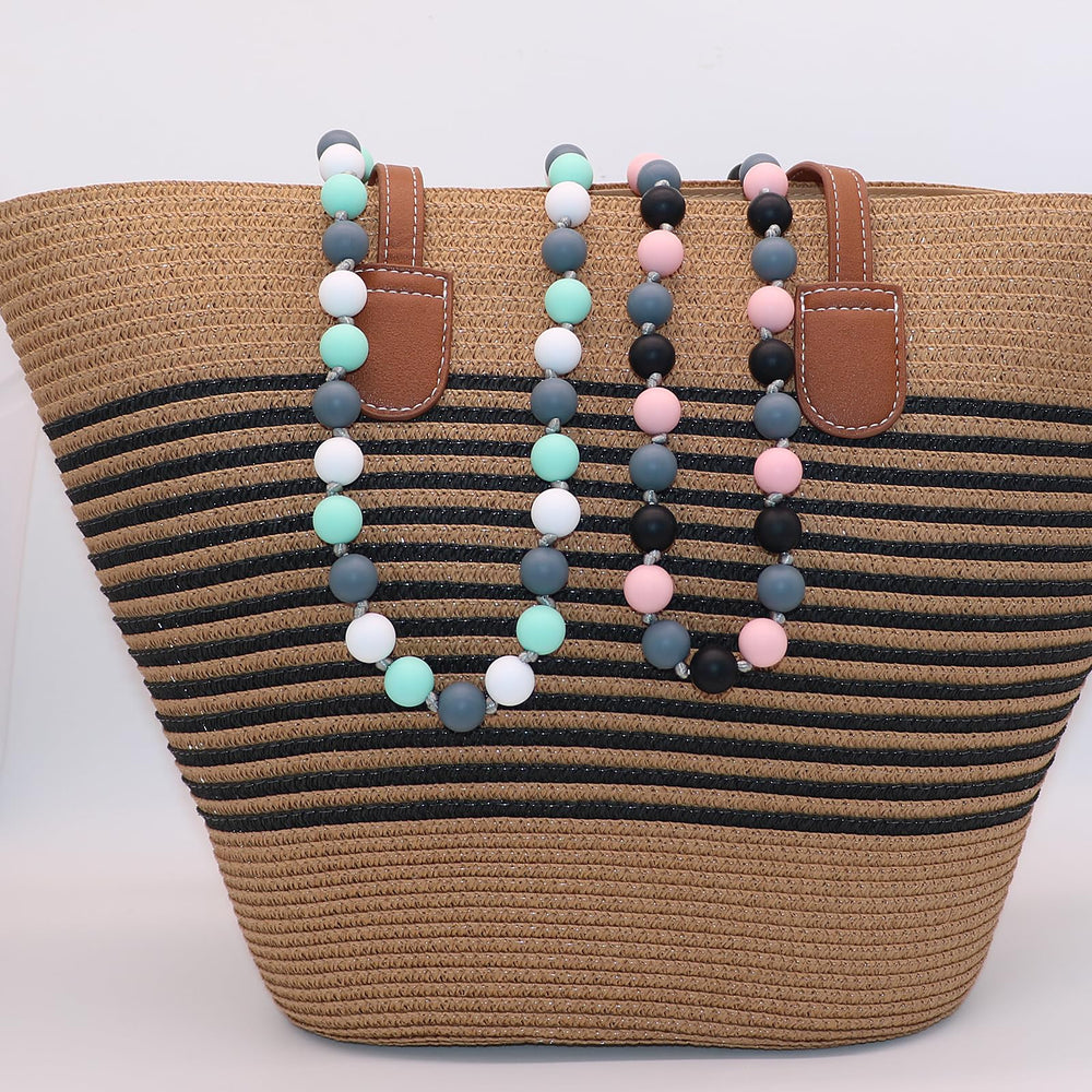 Flyaway chew necklaces on a child, showcasing stylish wear that appeals to sensory seekers.