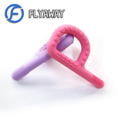 Flyaway Teething Sticks in a baby's hand during play