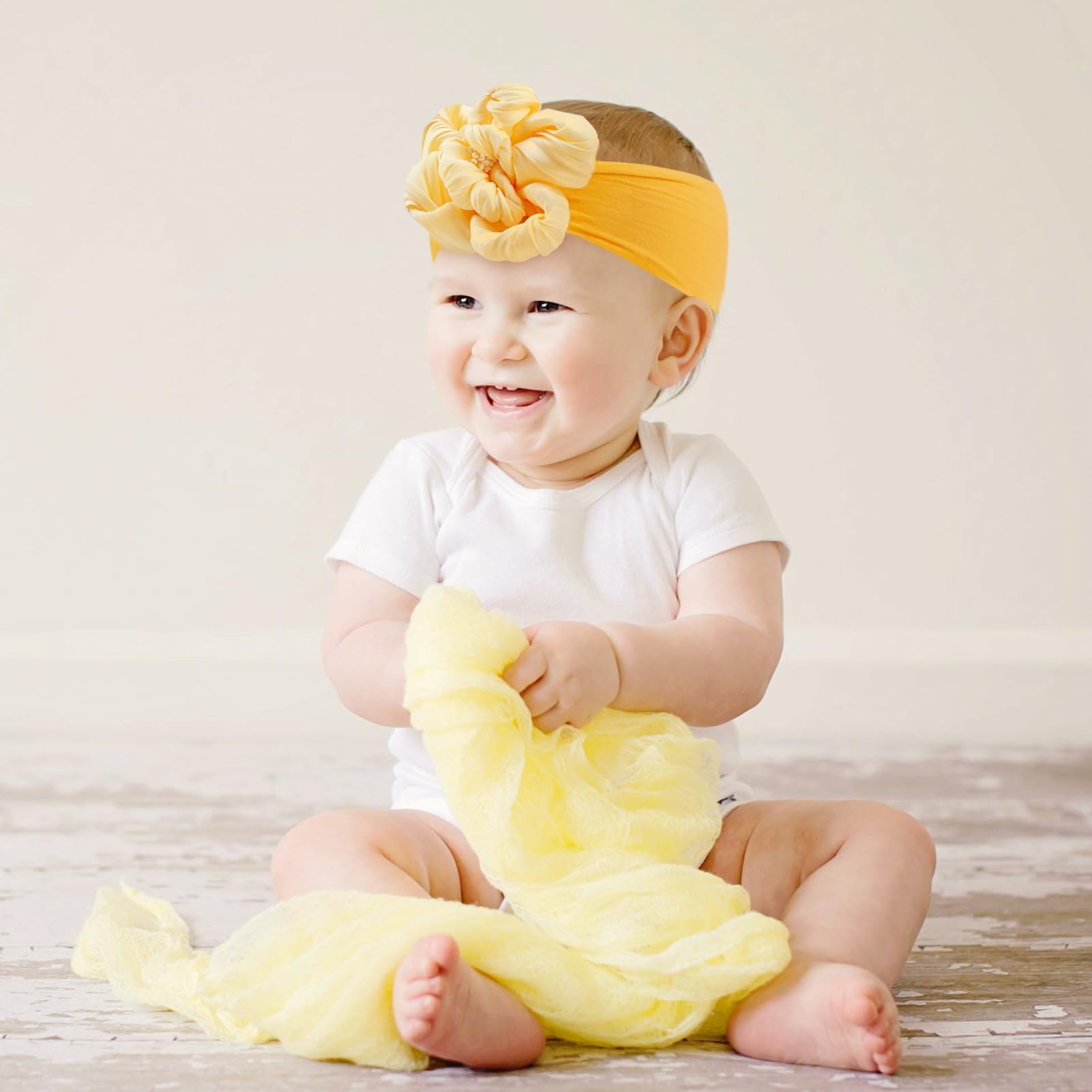 Fmeida baby headband in yellow offered as a gift idea for baby showers