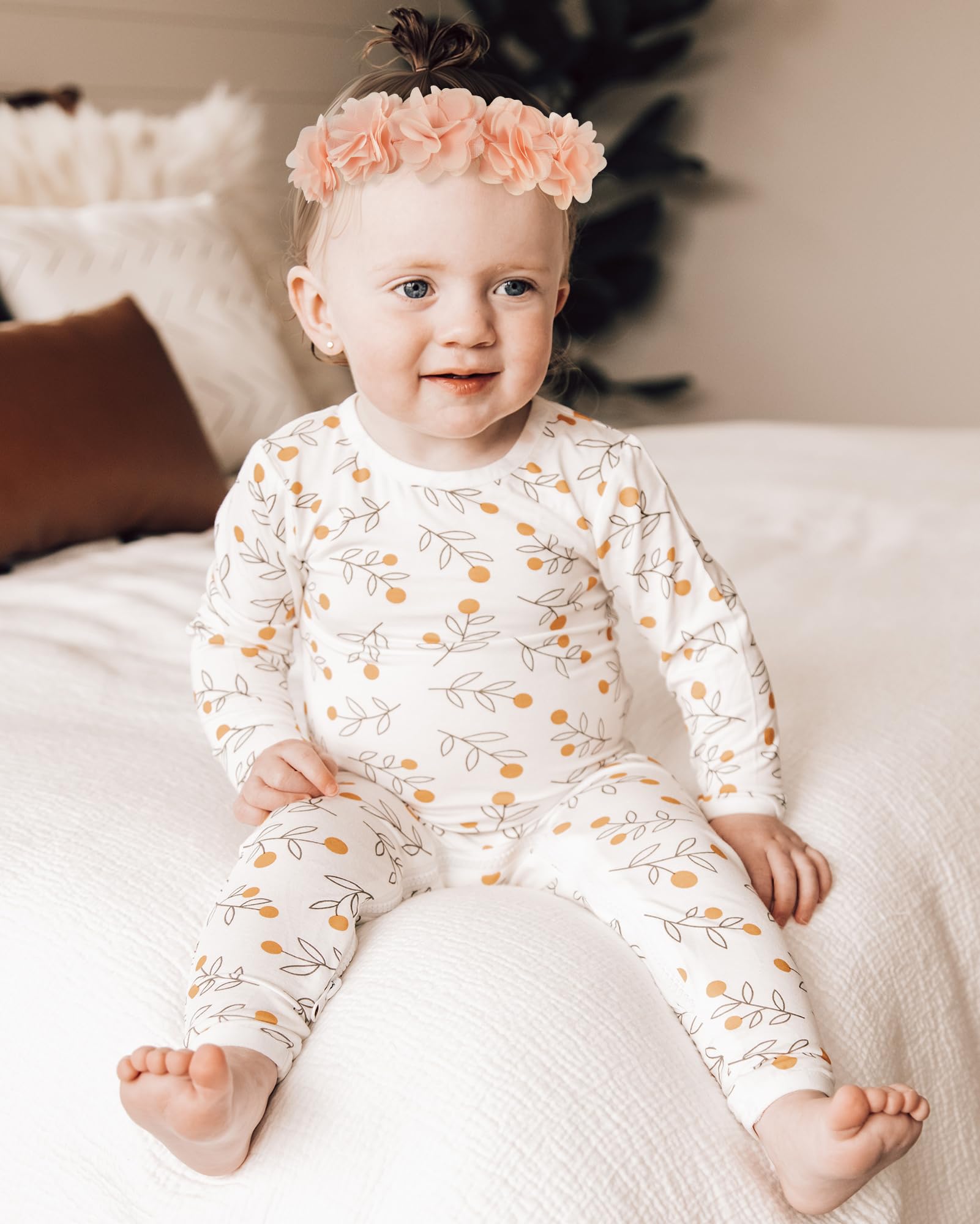 Fmeida headband side view demonstrates adjustable fit for 0-4 years