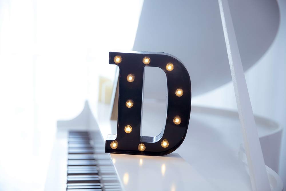 Foaky LED marquee number sign on wall creates stylish letter lighting for events