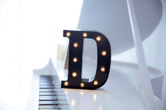 Foaky LED marquee number sign on wall creates stylish letter lighting for events