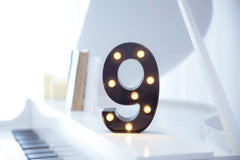 Foaky marquee number sign wall-hanging setup powered by batteries for unplugged décor