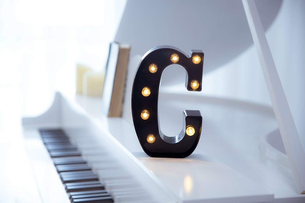 Foaky LED marquee number sign wall-hanging highlights personalized decor for celebrations.