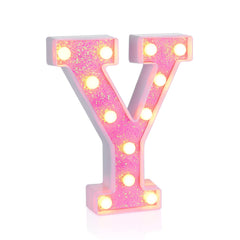 Foaky pink light up letters closeup showing glitter finish and glow