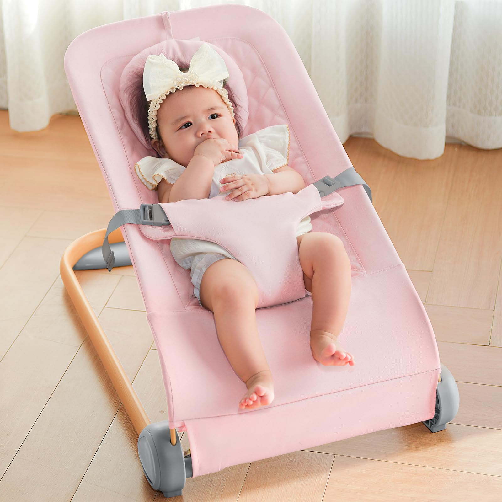 Fodoss Baby Bouncer ergonomic-design close-up illustrates supportive seat for newborn comfort.