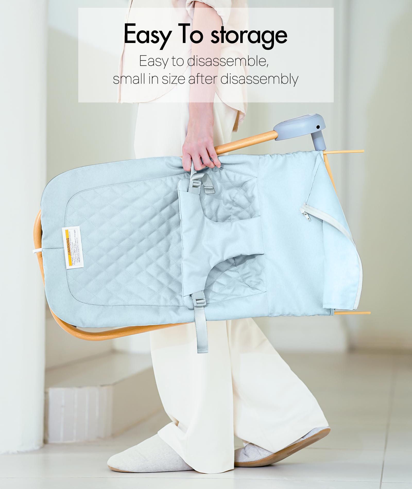 Fodoss Baby Bouncer in use bedside blue for near reach.