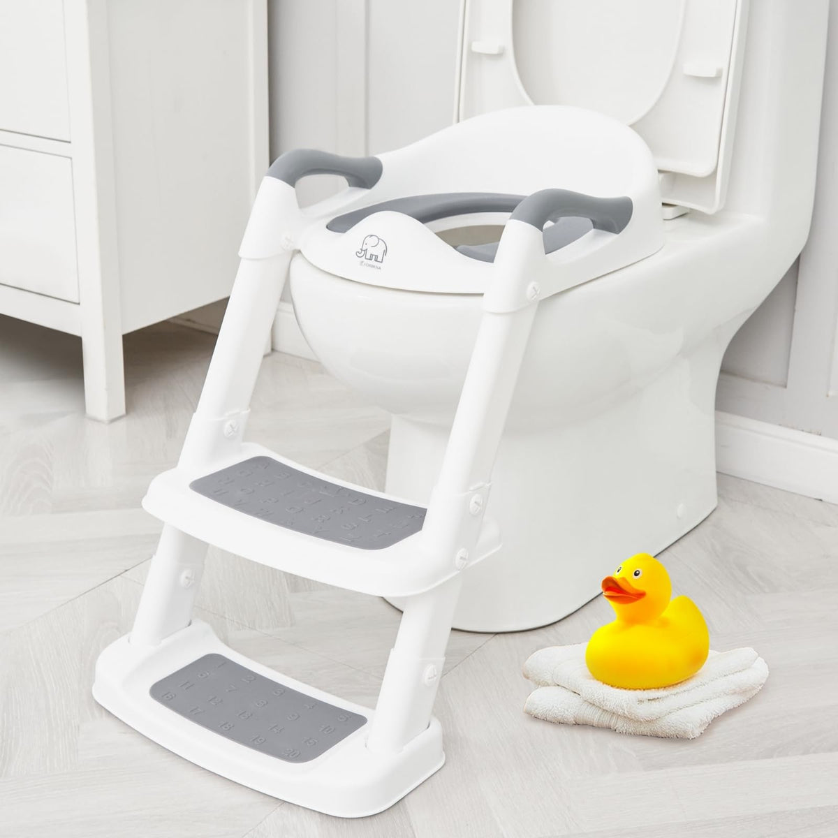Forbena potty seat step-stool handles closeup shows secure grip for confident potty training.