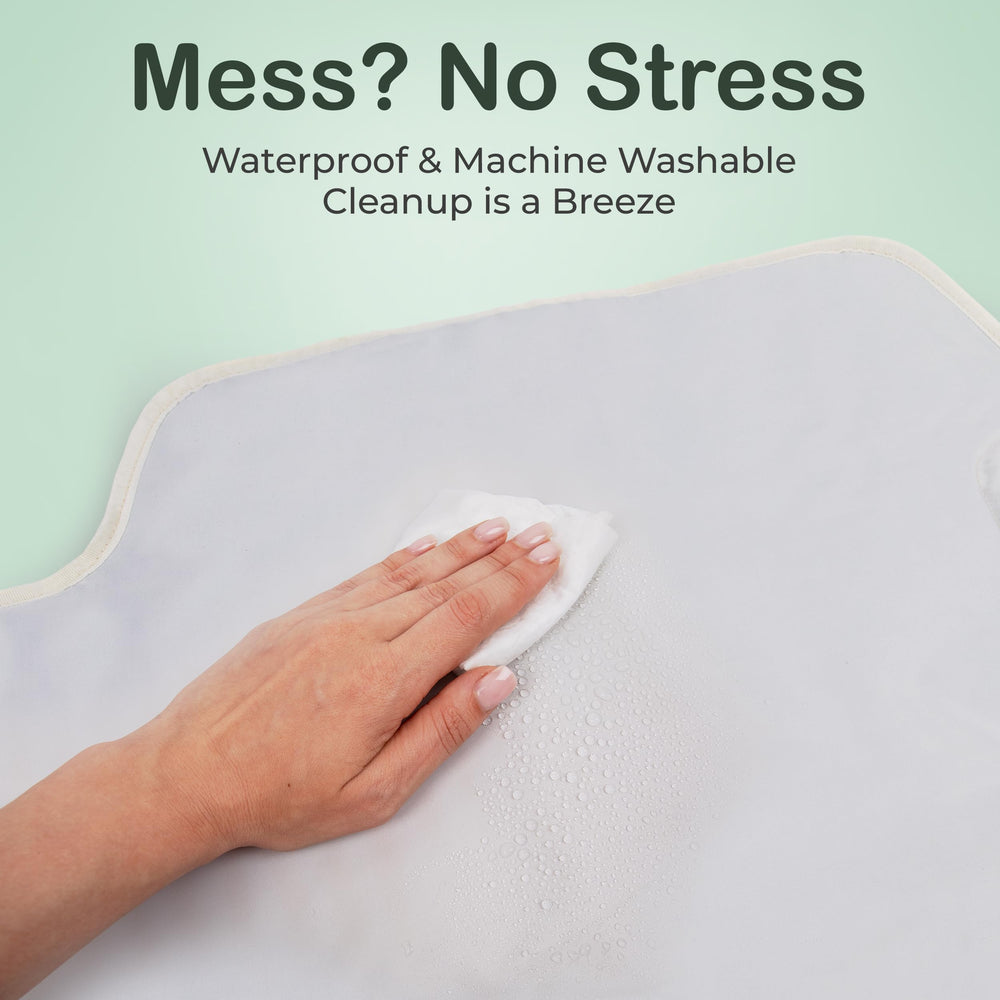 Four Cuddles changing pad with easy-clean wipeable surface handles messes on demand.