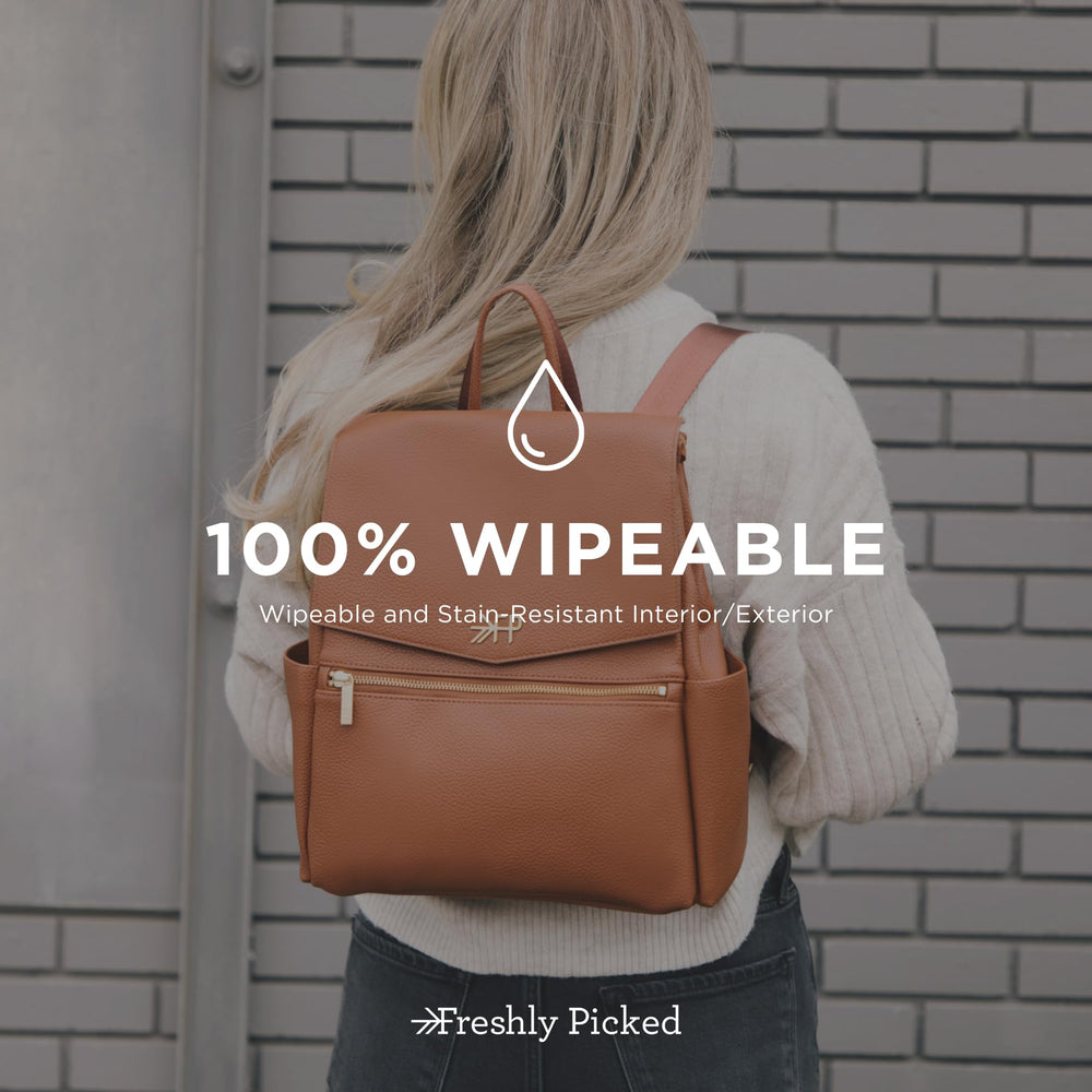 Freshly Picked Mini Classic cognac bag feet provide stability