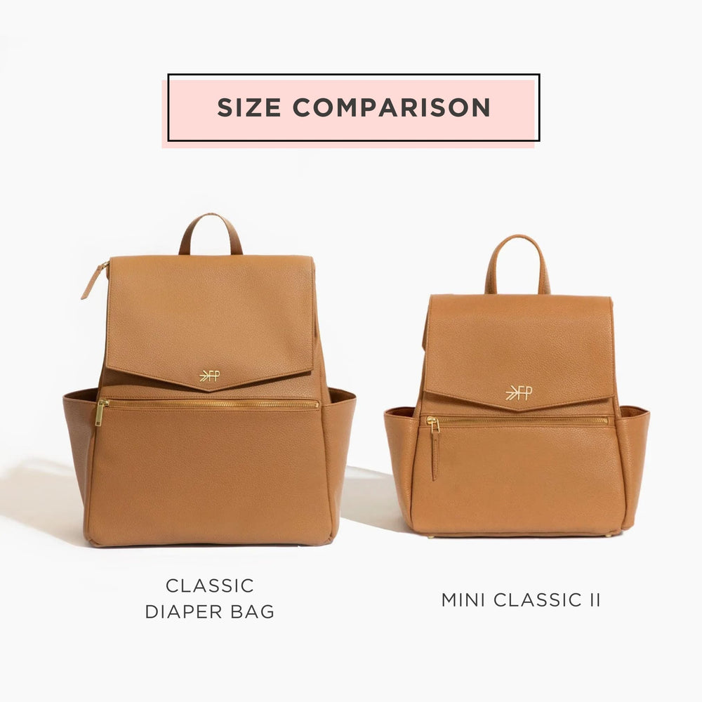 Adjustable shoulder straps on Freshly Picked Mini Classic Diaper Bag Backpack for comfortable all-day wear.