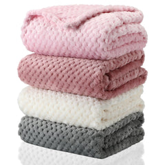 Frienda baby fuzzy blanket folded-compact for space-saving storage and travel warmth.