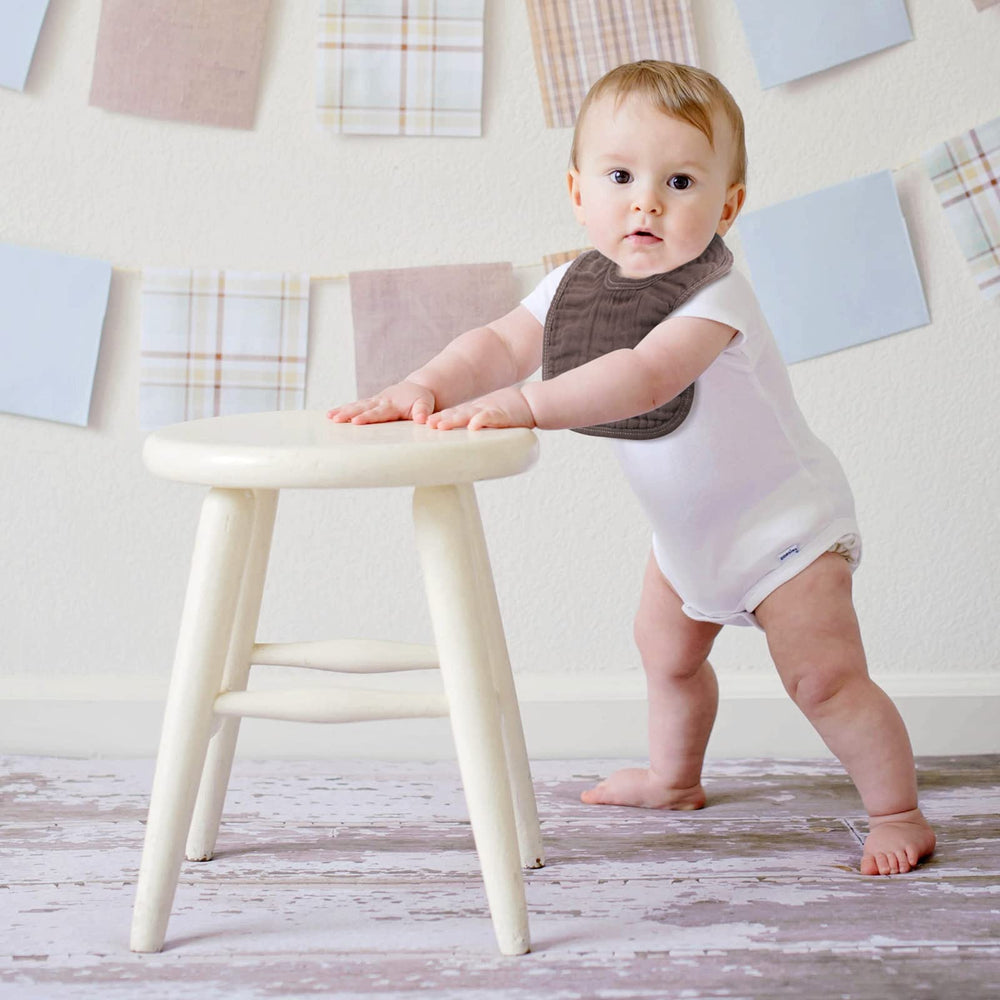 Frienda bibs with snaps stay secure during feeding and teething.