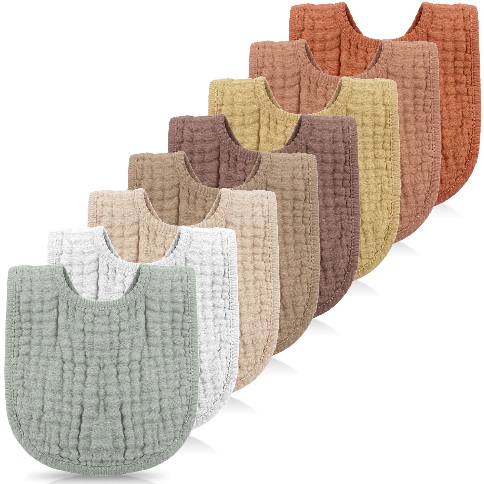 Frienda 8-pack muslin bibs in warm colors laid out for daily use.