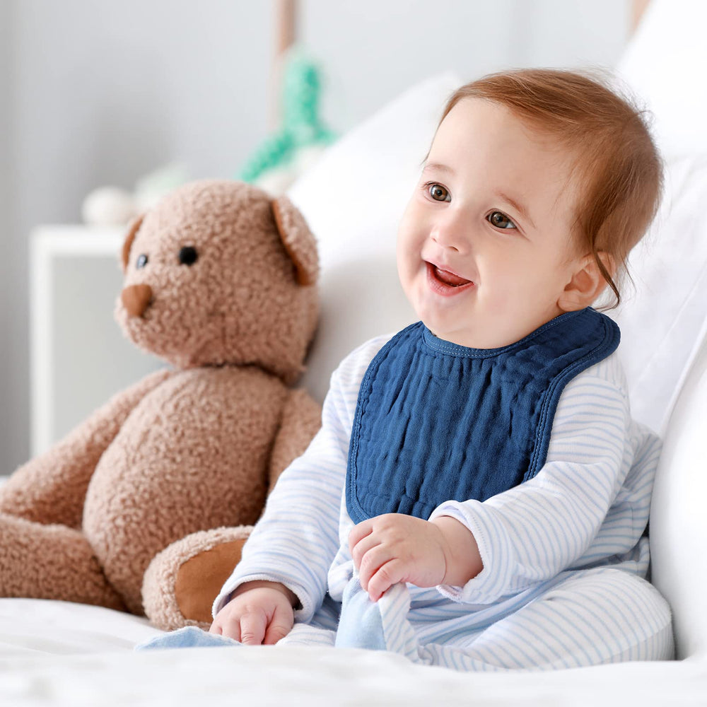 Frienda muslin bibs multi-use applications demonstrate bibs, burp cloths, washcloths and changing pads