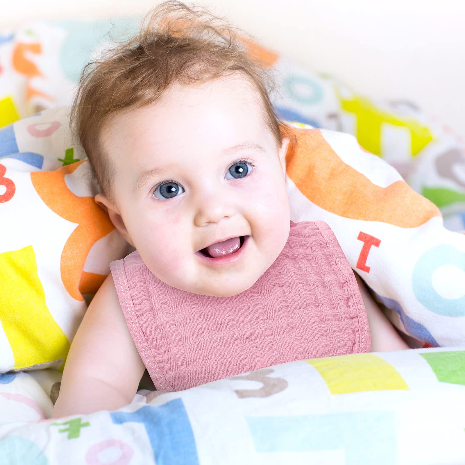 Frienda pink-series muslin bibs with snaps for quick, secure wear.