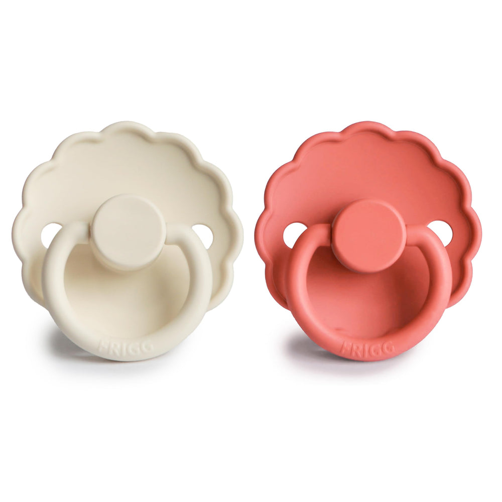 FRIGG Daisy pacifier outward curve keeps nipple off baby's skin for comfort.