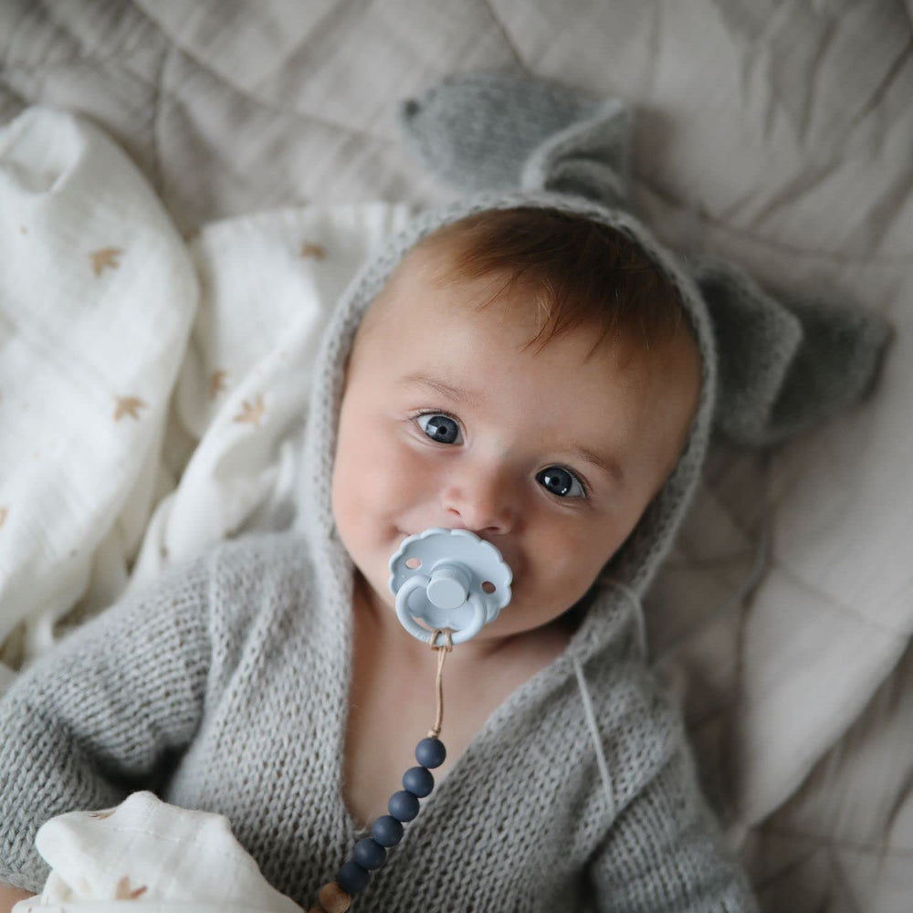 FRIGG Daisy SilkySoft air holes support breathability for baby comfort.