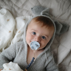 FRIGG Daisy SilkySoft air holes support breathability for baby comfort.