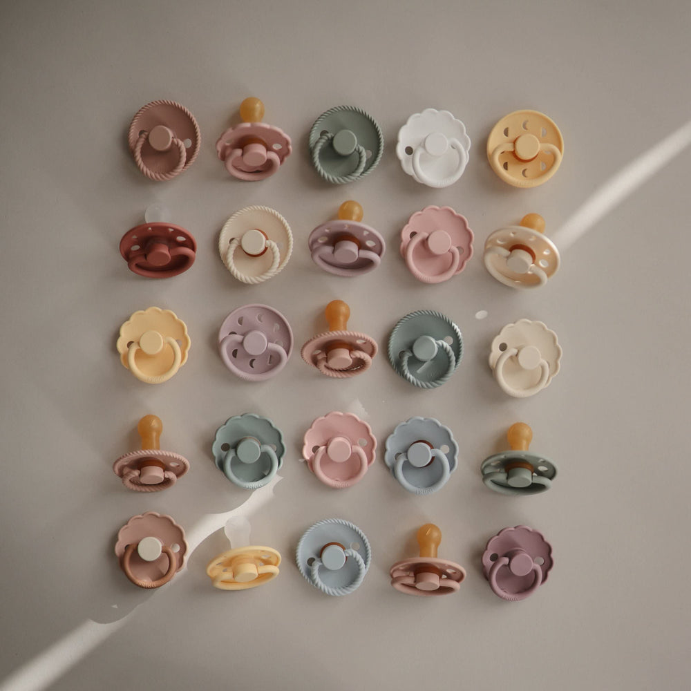 FRIGG Danish manufacturing badge communicates quality and heritage