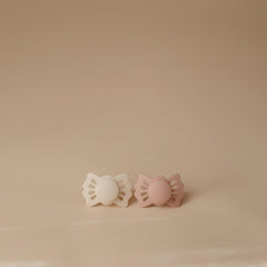 Frigg Lucky clover shield with air holes improves breathability during use
