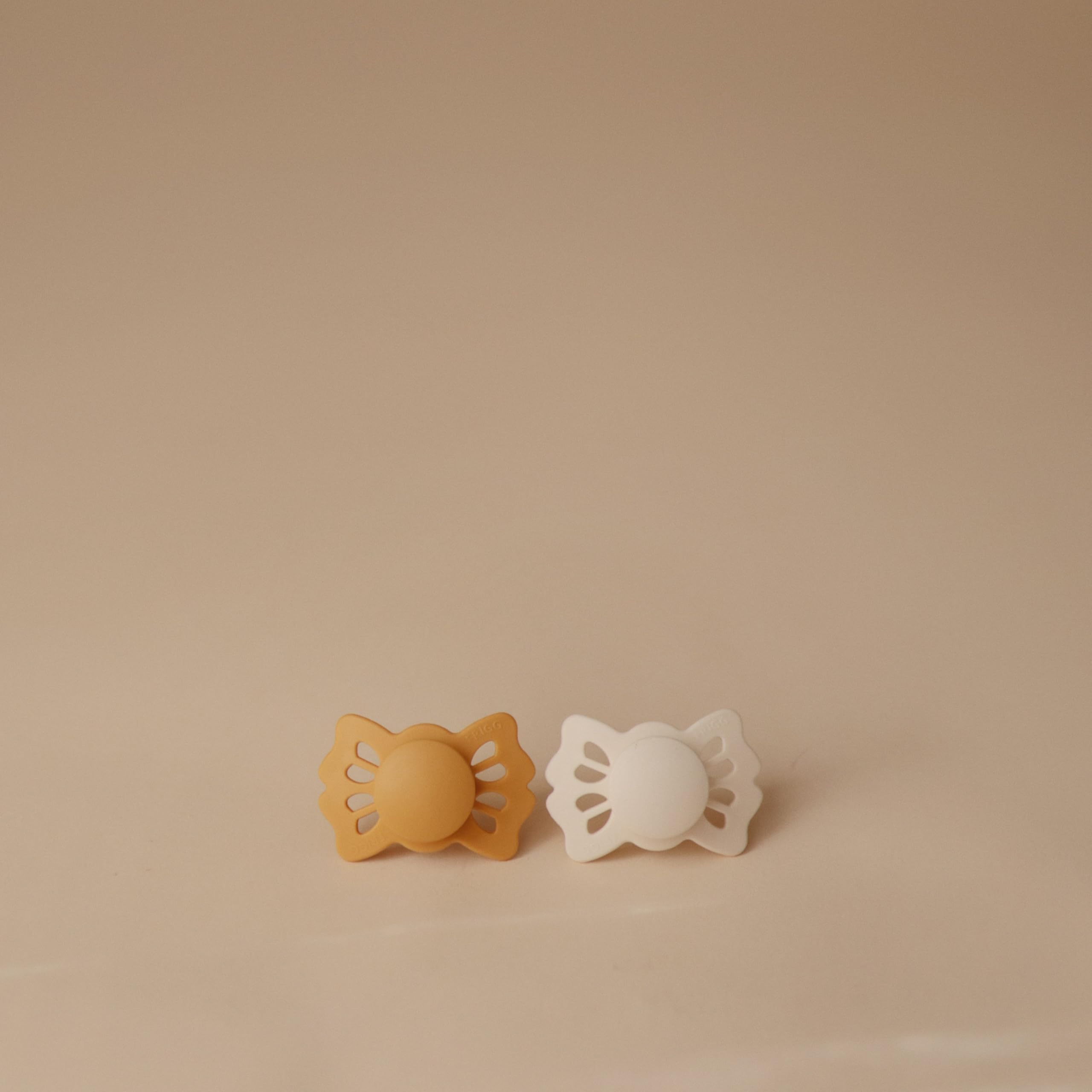 Frigg Lucky Honey Gold Cream color adds gentle aesthetic to baby essentials.