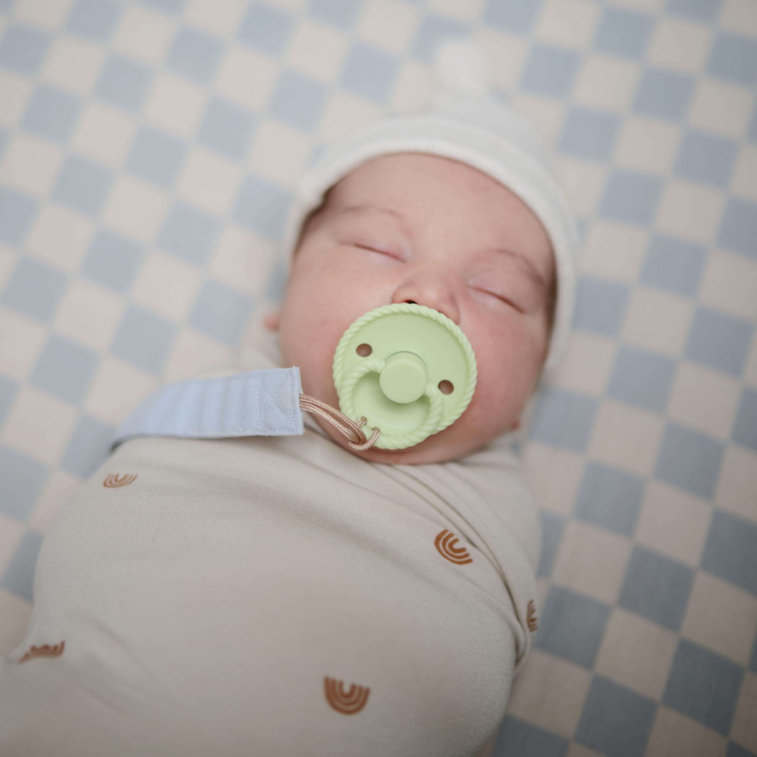 FRIGG rope latex pacifier air holes close-up highlighting improved breathability and hygiene