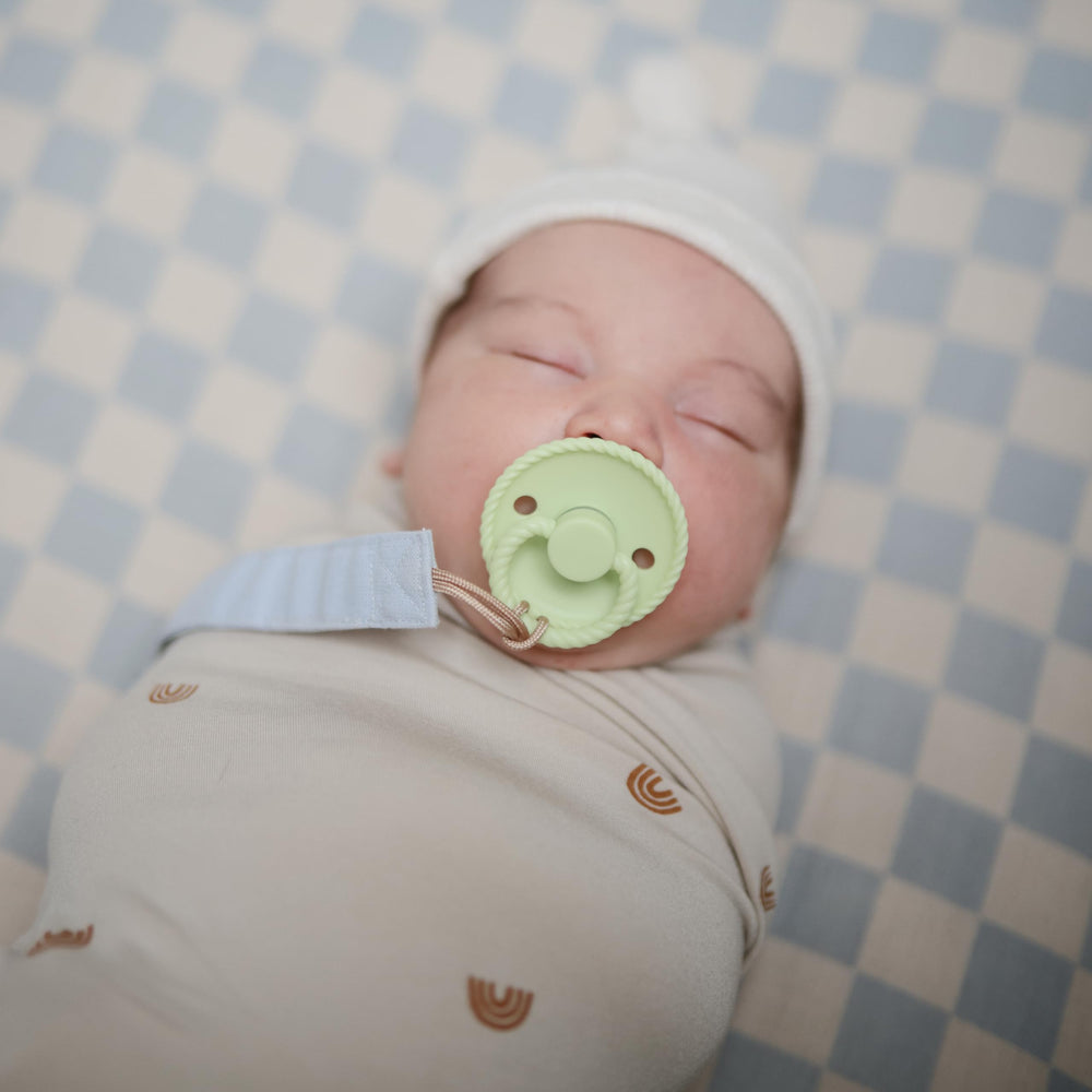 FRIGG rope latex pacifier air holes close-up highlighting improved breathability and hygiene