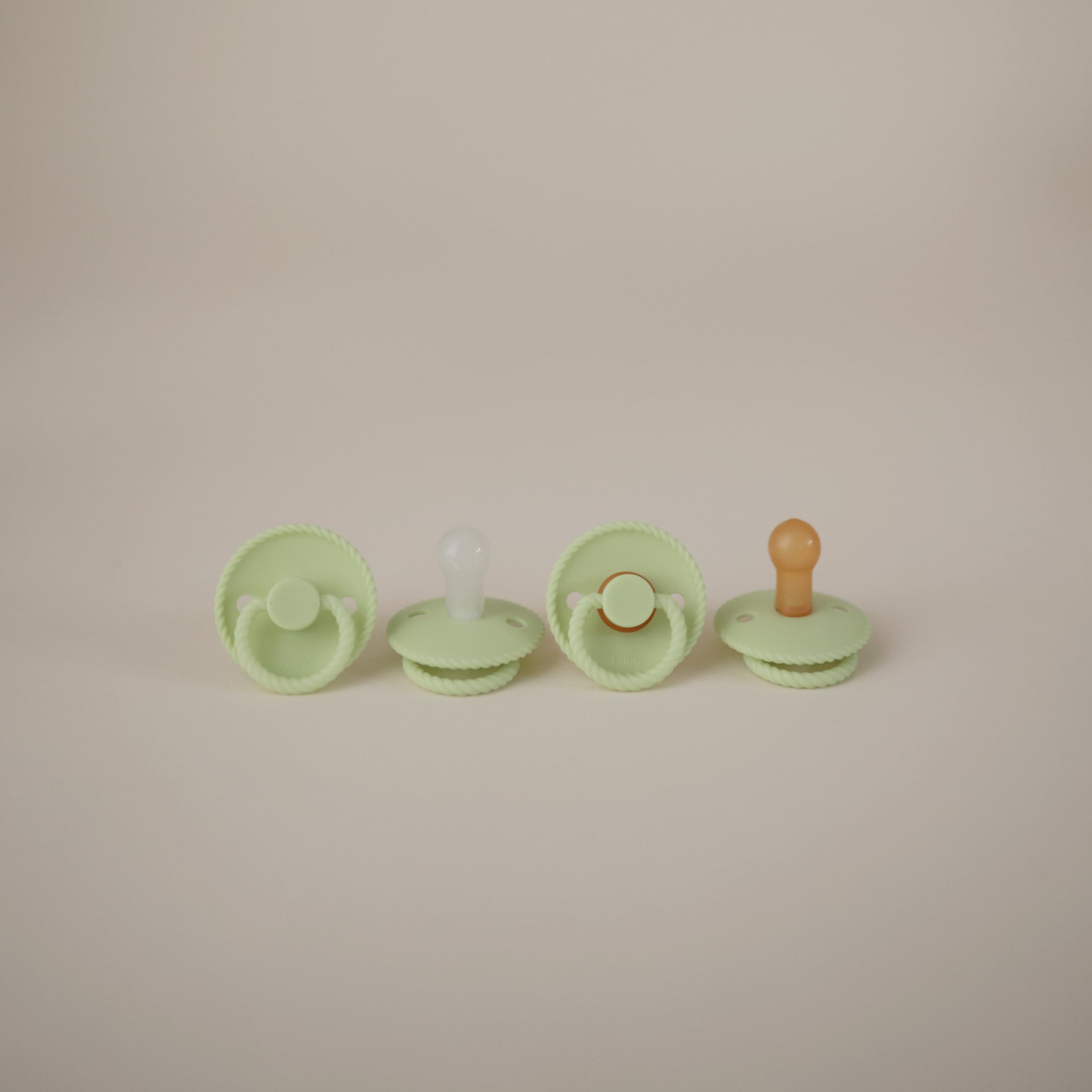 FRIGG air holes visible for breathability and baby comfort.