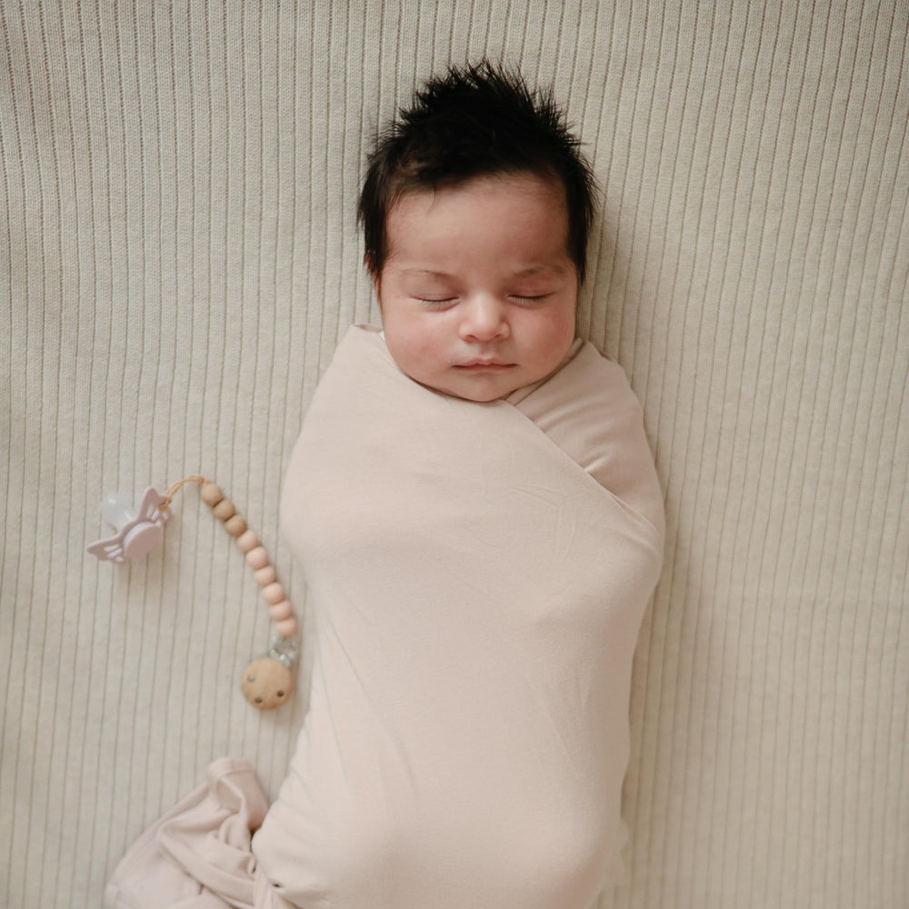FRIGG Butterfly size label indicates suitability for 6-18 months