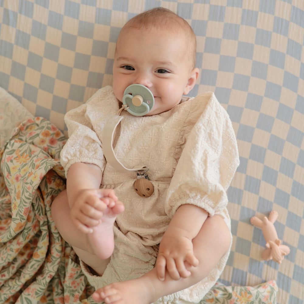 FRIGG click-lock system secures pacifier components for worry-free use
