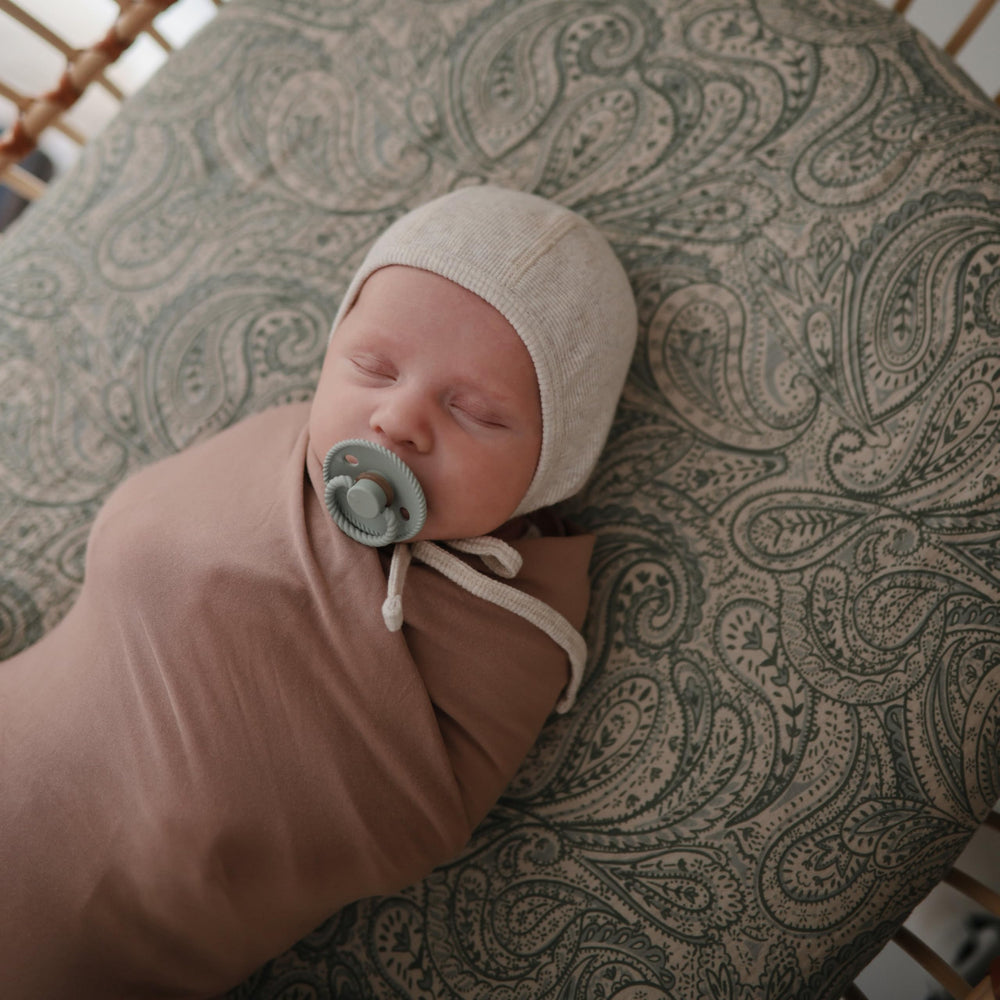 FRIGG SilkySoft pacifier security-handle for easy retrieval and secure use.