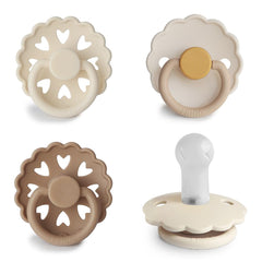 FRIGG SilkySoft pacifier Snowflake Dream close-up shows gentle silicone nipple for soothing comfort.