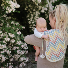 FRIGG SilkySoft pacifier air holes and security handle support safe use.