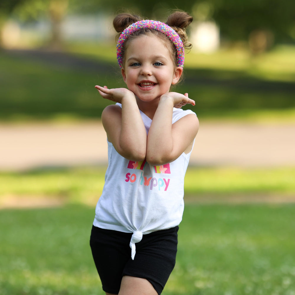 FROG SAC Colorful headband enhances outfits with sprinkles.