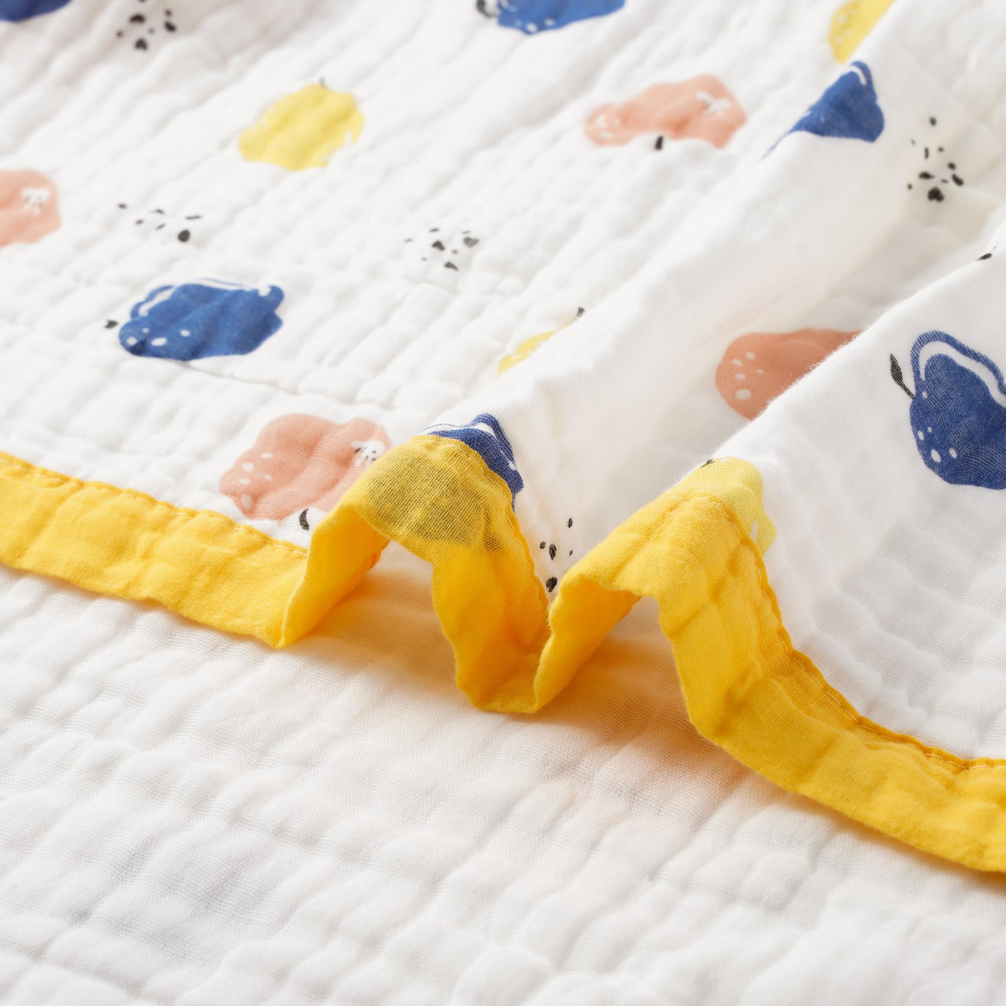 Fruit Muslin Baby Blanket sun-shade setup offers breathable shade outdoors.