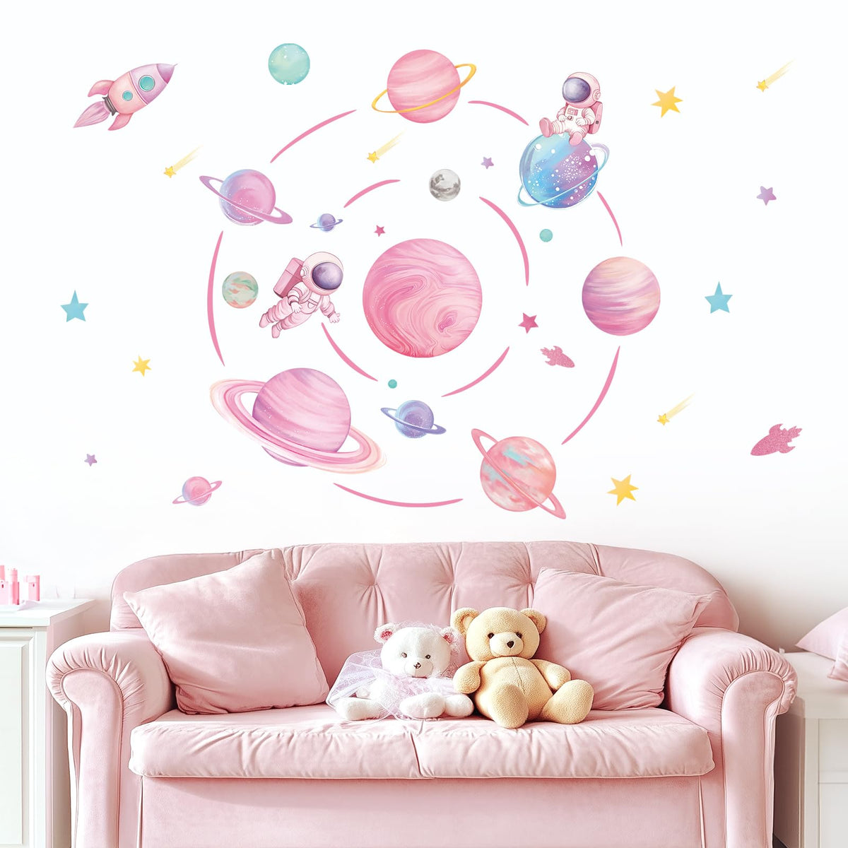 FUFUQUARE pastel pink planet orbits wall decal with rocket sparks imaginative play in kids room.