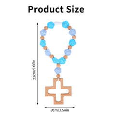 Fukaisu blue silicone rosary teether with wooden cross supports safe, soothing baby handling.