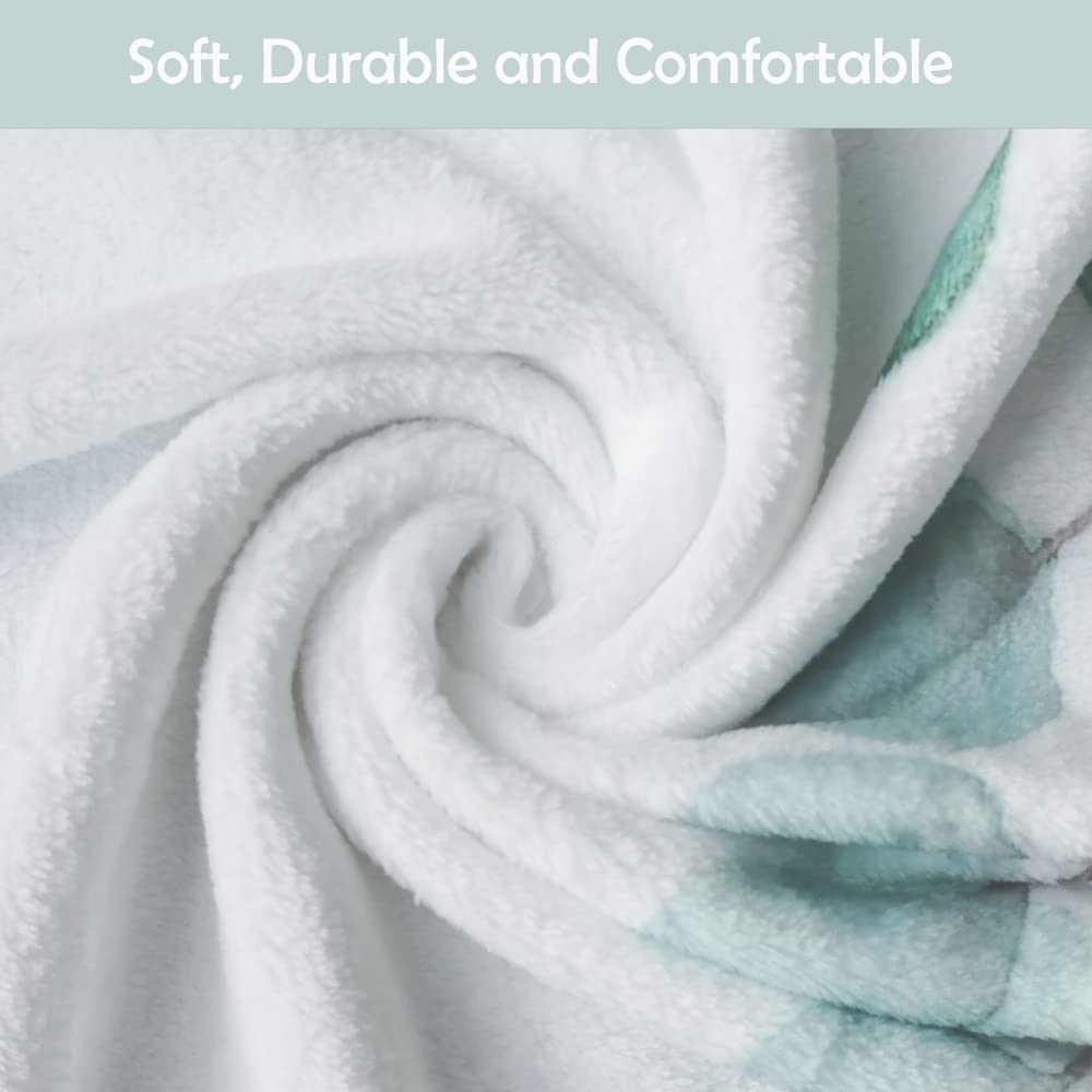 Fundich milestone blanket blends into gentle eucalyptus nursery decor.