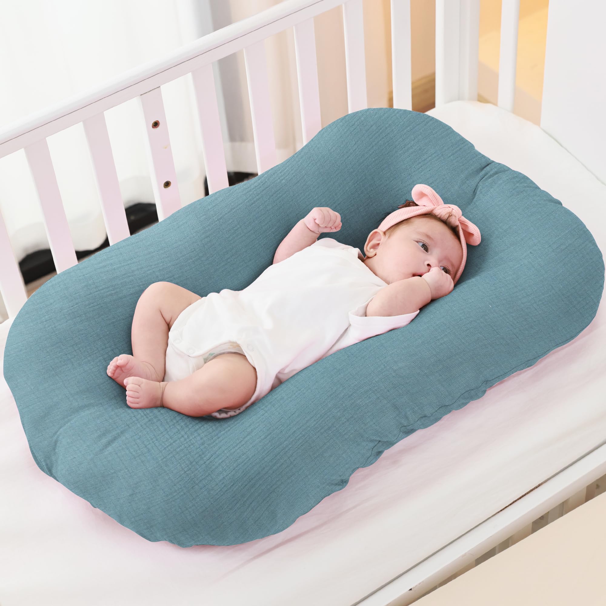FUNUPUP Muslin cover on lounger demo, showcasing easy stretch fit.