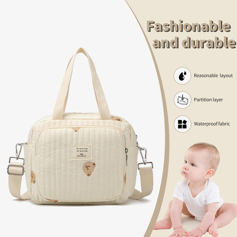 Fwkekye small diaper bag tote off white color suits outfits and baby essentials.